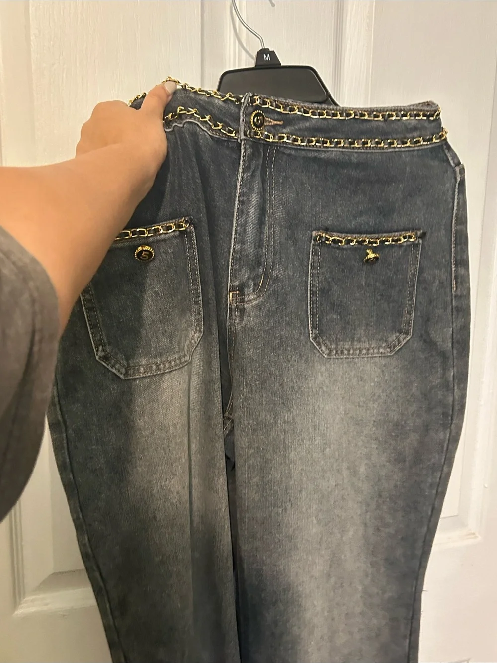 CHANEL Dark Blue Denim Jeans with Gold Chain Trim